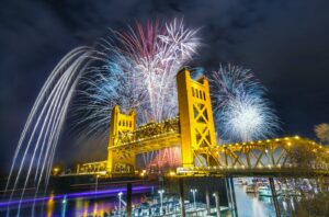 bridge with fireworks during nighttime